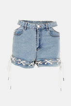 Load image into Gallery viewer, Lace-Up Cutout Denim Shorts