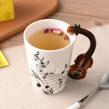 Cargar imagen en el visor de la galería, Creative Music Violin Style Guitar Ceramic Mug Coffee Tea Milk Stave Cups With Handle Coffee Mug Novelty Gifts
