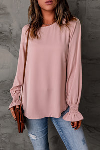 Blusa con cuello redondo y mangas con volantes