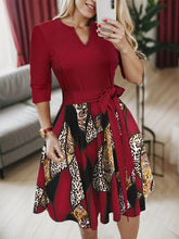 Load image into Gallery viewer, Plus Size Printed Tie Front Notched Long Sleeve Dress
